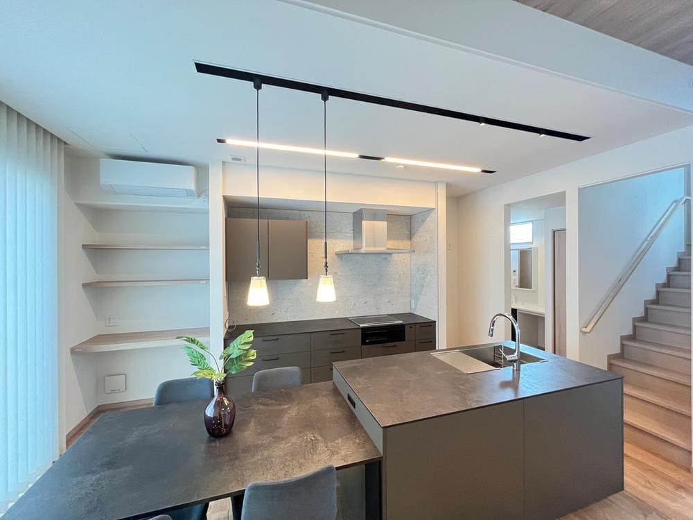 Modern kitchen fitted with appliances and furniture — the household goods AKI HOME's recycle shop buys and sells